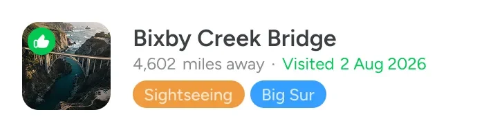 A Pin Drop place card for Bixby Creek Bridge, shown over the road it sits on.
